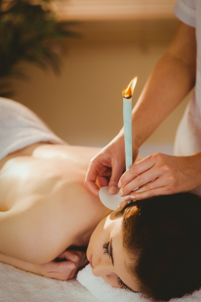 young-woman-getting-ear-candling-treatment